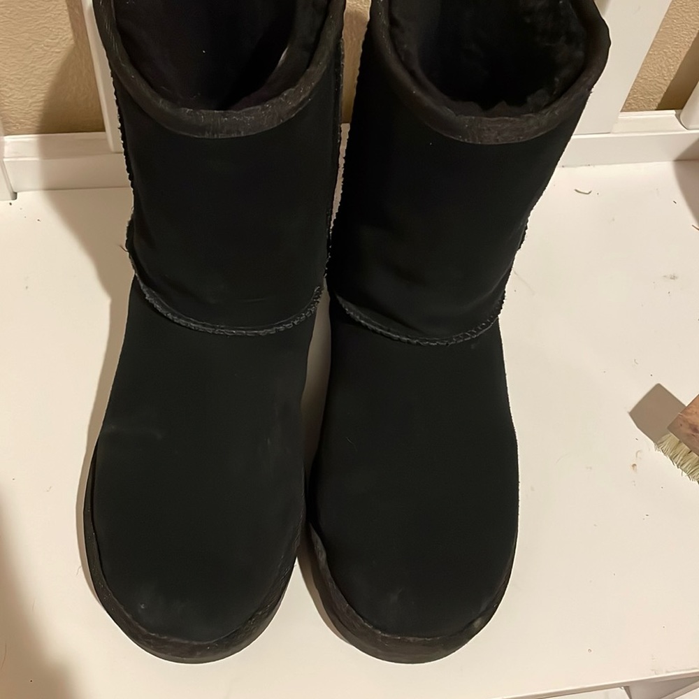 - Black UGG boots